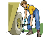 une homme qui repare un pneus